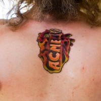 Acme chest tattoo