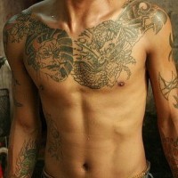 Wicked dragon chest tattoo