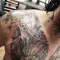 Monster chest tattoo