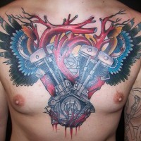 Winged instrument chest piece tattoo
