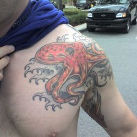 Devil-fish chest tattoo