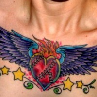 Burning heart chest tattoo