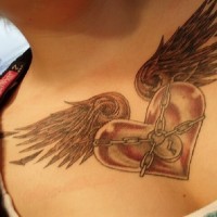 Heart locked chest tattoo