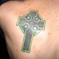 Green celtic christian cross tattoo