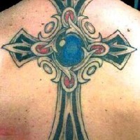 Latin cross with gems tattoo