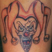 Insane buffoon colourful tattoo