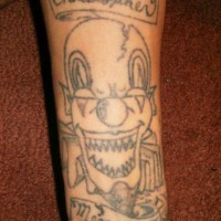 Sharp toothed clown with text on stripe black ink