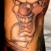 Angry clown on lowrider tattoo