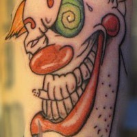 tatuaje en color de payaso con barbilla fumando