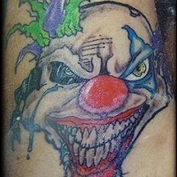 pagliaccio mezzo morto tatuaggio colorato