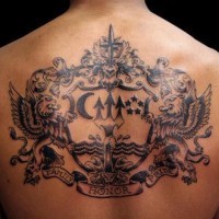 Large tattoo on back with heraldic emblems