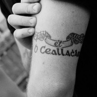 Irish motto writings tattoo