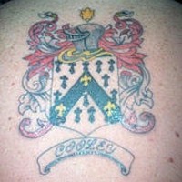 Heraldic shield emblem coloured tattoo