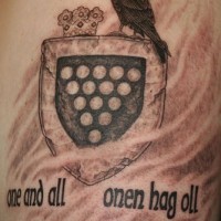 Heraldic shield with crown and raven tattoo
