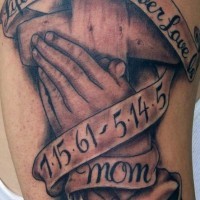 Cross and praying hands memorial tattoo