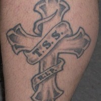 Memorial black ink cross tattoo