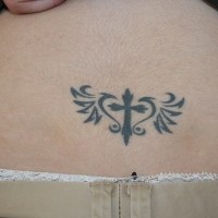 Winged cross in heart tattoo