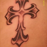 Heraldic cross tattoo