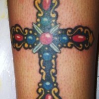 Cross with gems tattoo