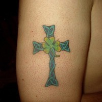 Celtic cross with clover tattoo