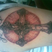 Angel cross in circle tattoo