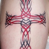 Red and black tracery cross tattoo