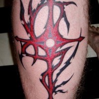 Tribal style red cross tattoo