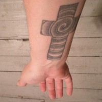 Cross with spiral in it tattoo