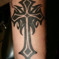 Tribal style cross tattoo