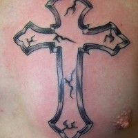 Stone cross tattoo on chest