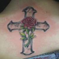 Cross with red rose tattoo