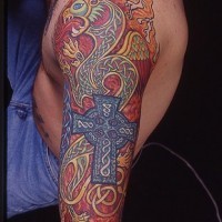 Middle age dragon and cross coloured tattoo