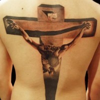 Realistic crucifixion tattoo on back