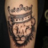 Crowned lion black ink  tattoo