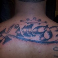 Large king text with crown tattoo on back