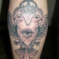 Crowned two head dove with eye artwork tattoo