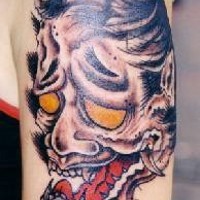 Asian style demon coloured tattoo