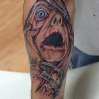 Death in agony arm tattoo
