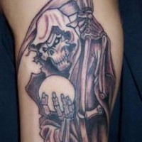 Death with magic sphere tattoo