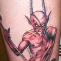 Horned red devil tattoo