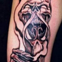Horned demon black ink tattoo