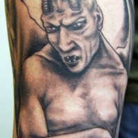 demone nero alato tatuaggio