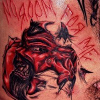 Bloody red devil skin rip tattoo
