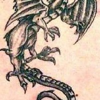 Black ink dragon tattoo
