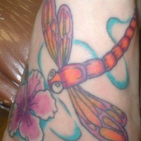 Dragonfly and flower coloured tattoo