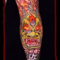 Chinese demon in flames coloured tattoo