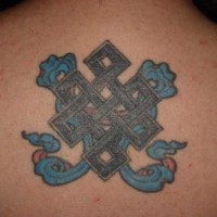 Heraldic knot tracery tattoo