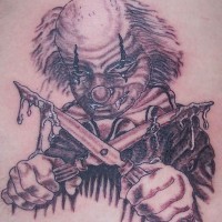 Evil clown with scissors in blood tattoo