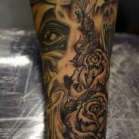 Evil eye and roses sleeve tattoo