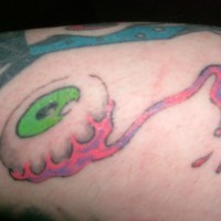 Le tatouage d’œil vert avec le sang